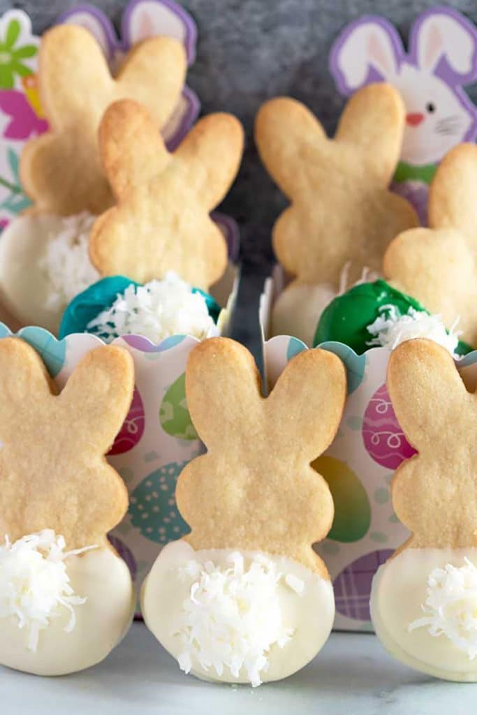 Festive Bunny cookies dipped in white chocolate with marshmallow tails