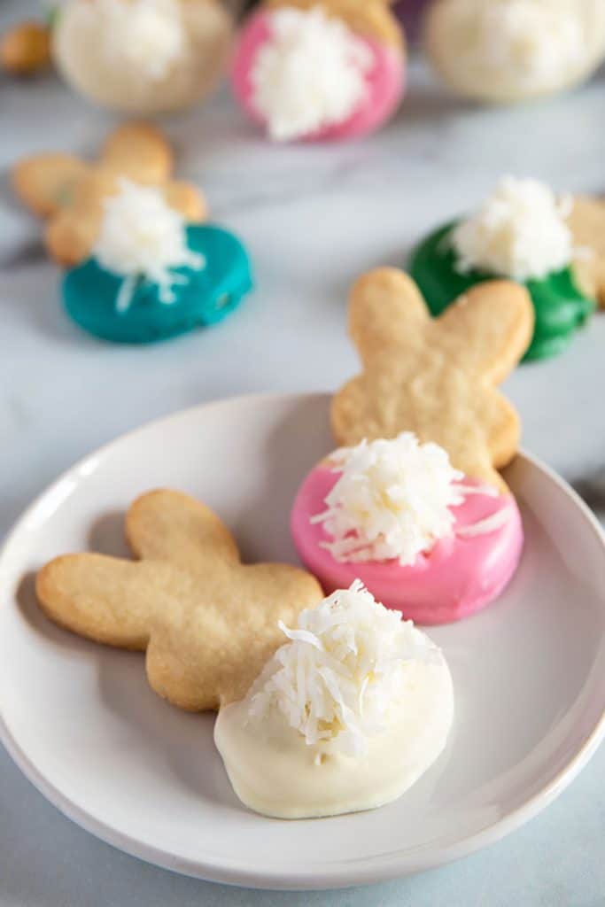 Easter Bunny Cookies with fluffy tails on a plate