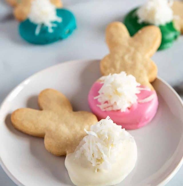 Easter Bunny Cookies with fluffy tails on a plate