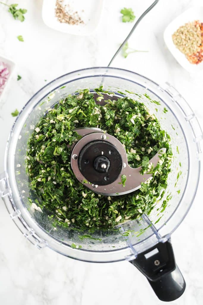 parsley and garlic finely chopped in a food processor
