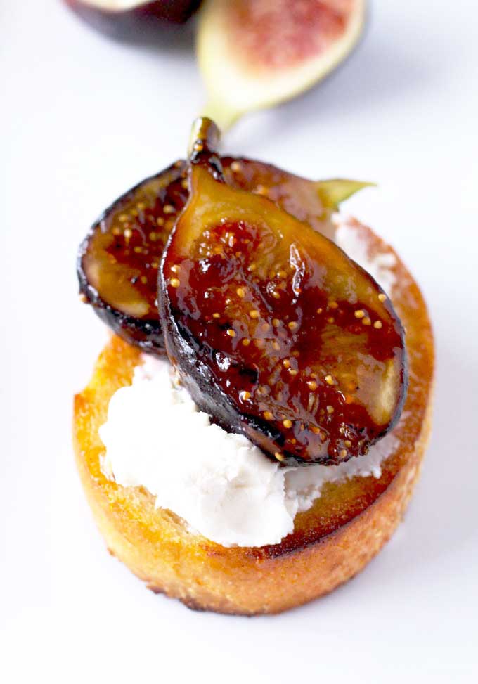 Crostini topped with creamy goat cheese and caramelized figs.