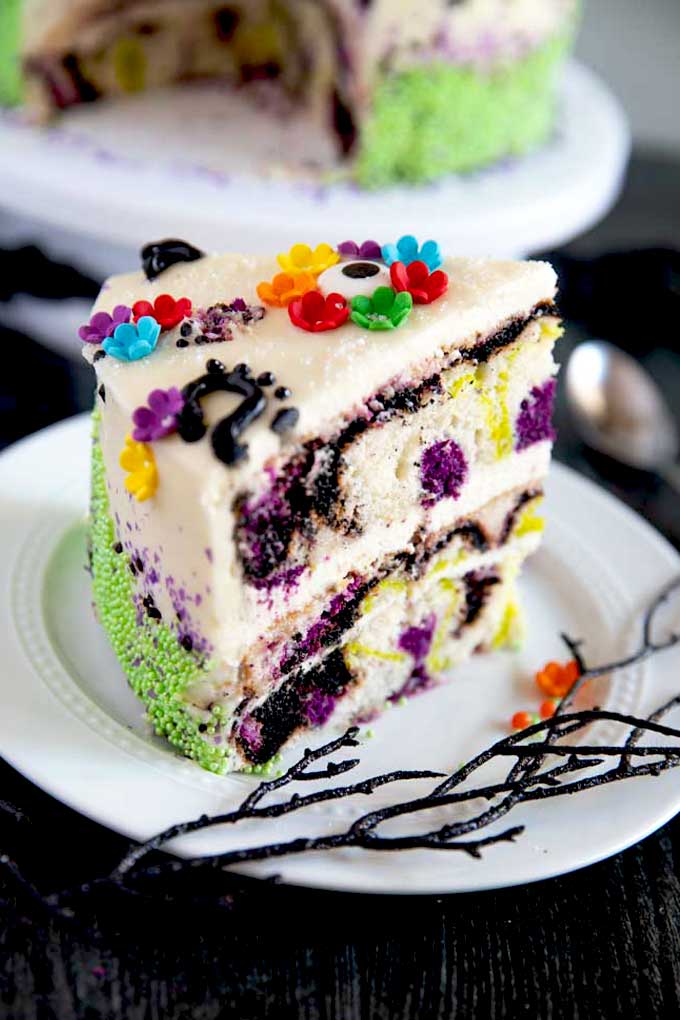 A slice of cake showing the colorful swirl in the batter.