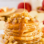 pin image of a stack of apple pancakes with caramel apples