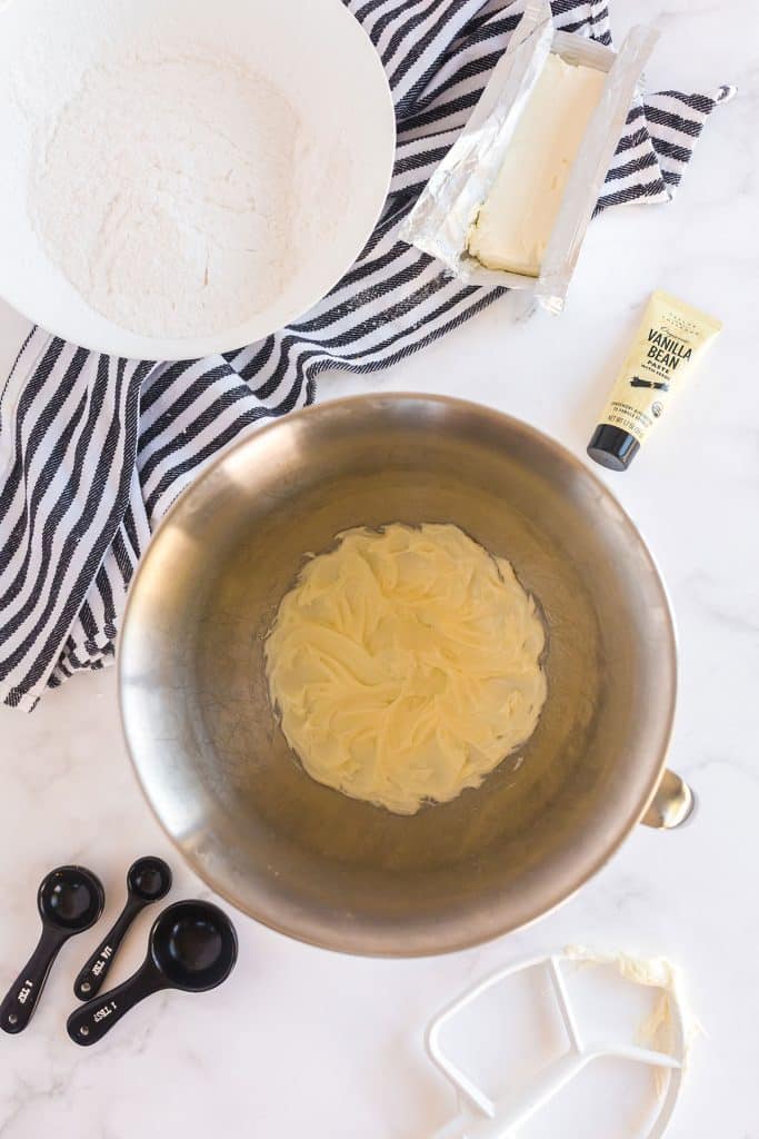 fluffy butter in the bowl of an standing mixer