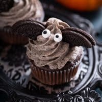 Chocolate Oreo Cupcakes with frosting decorated as Halloween bats