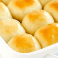 Golden brown rolls in a baking dish