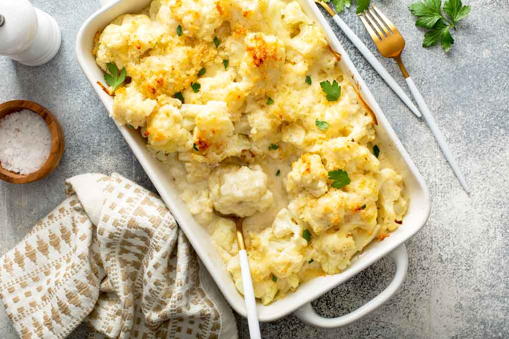 Top view of a creamy cheesy cauliflower casserole. 