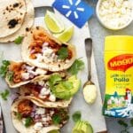 Pin image of chicken tinga tacos on a white board