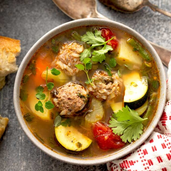 top view of a bowl of Mexican Meatball Soup garnished with cilantro