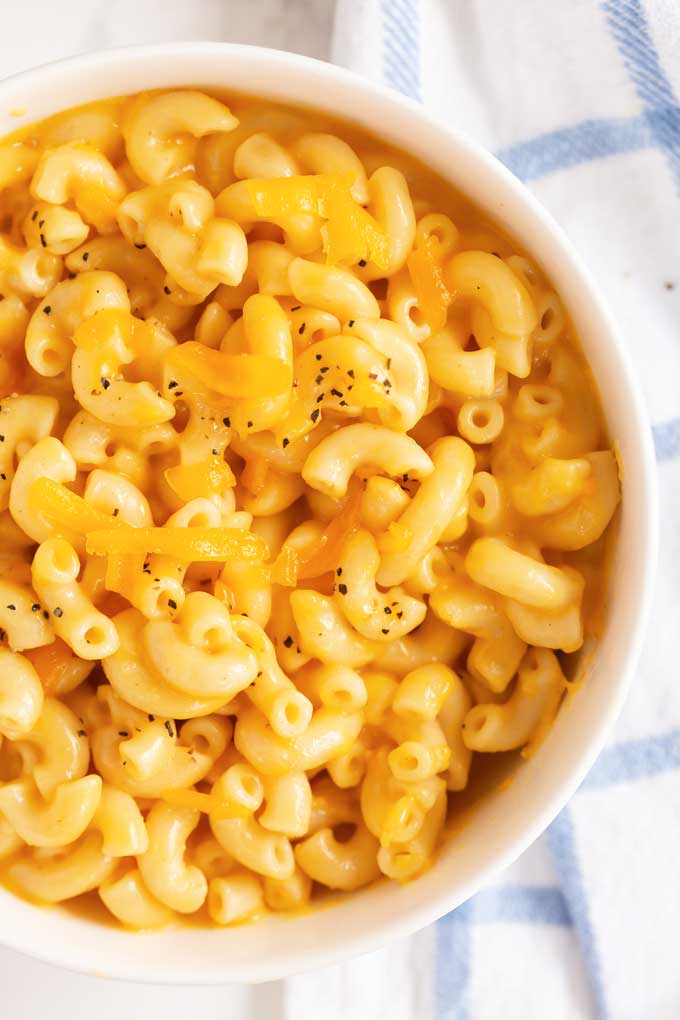 Top view of creamy Instant pot mac and cheese in a white bowl