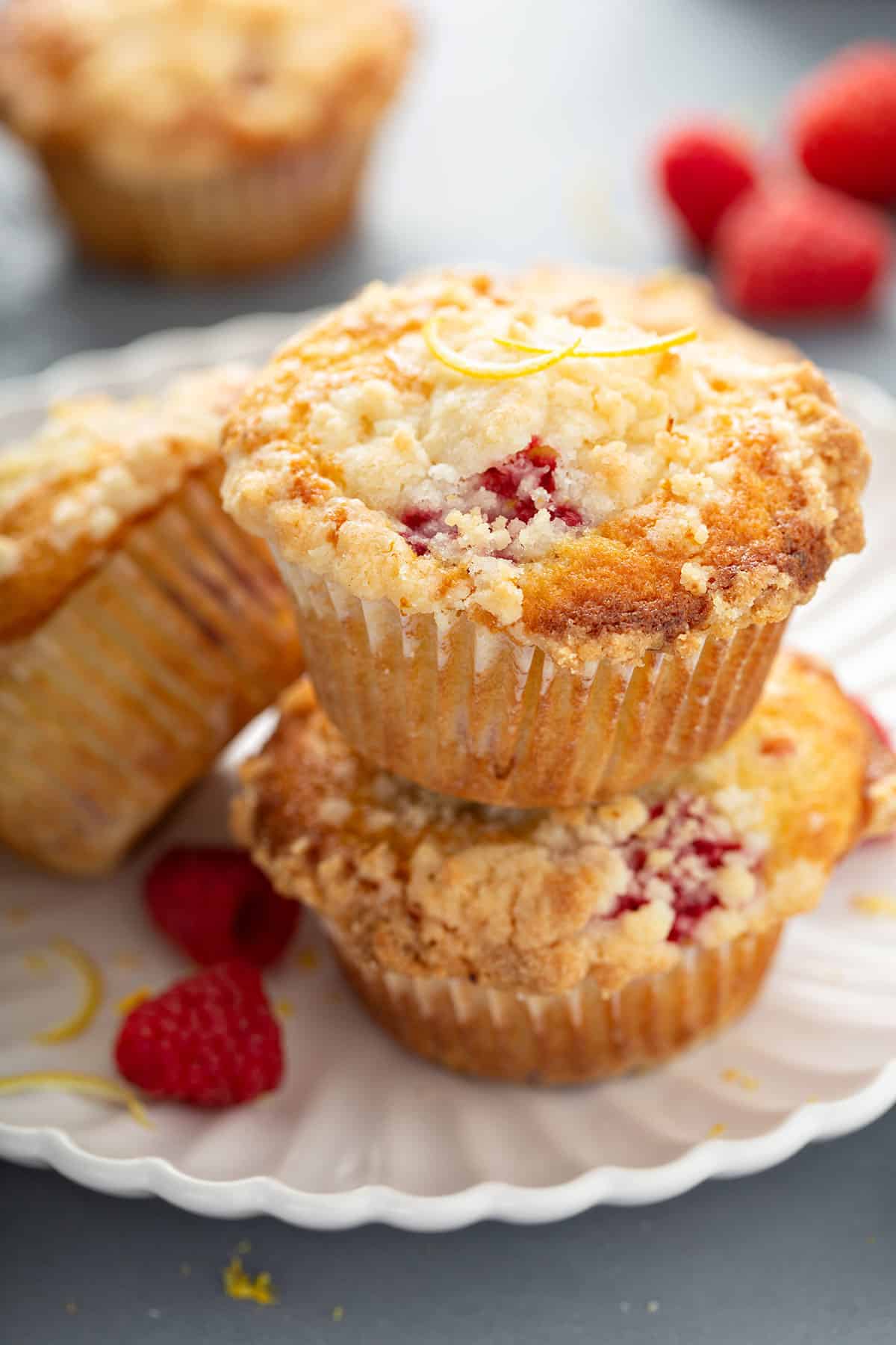 Stack of raspberry muffins on a plate