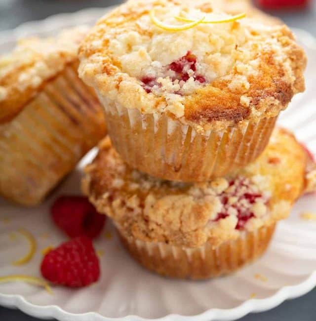 Stack of raspberry muffins on a plate
