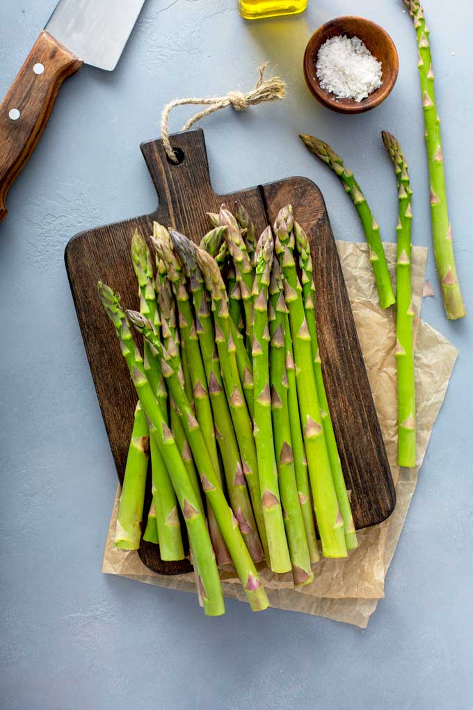 Fresh asparagus on a cutting board