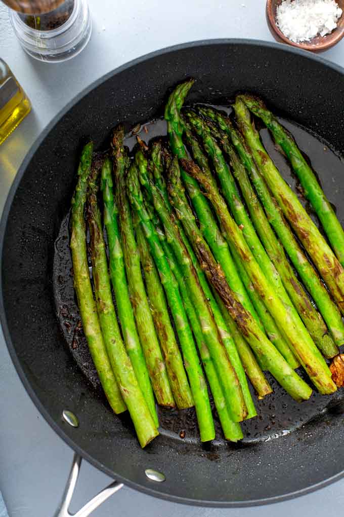 Pan roasted asparagus in a skillet