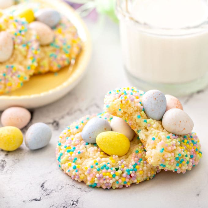 two Bird's Nest Funfetti cookies, one is bitten so it shows the textures