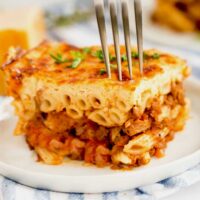 A serving of pastitsio on a white plate