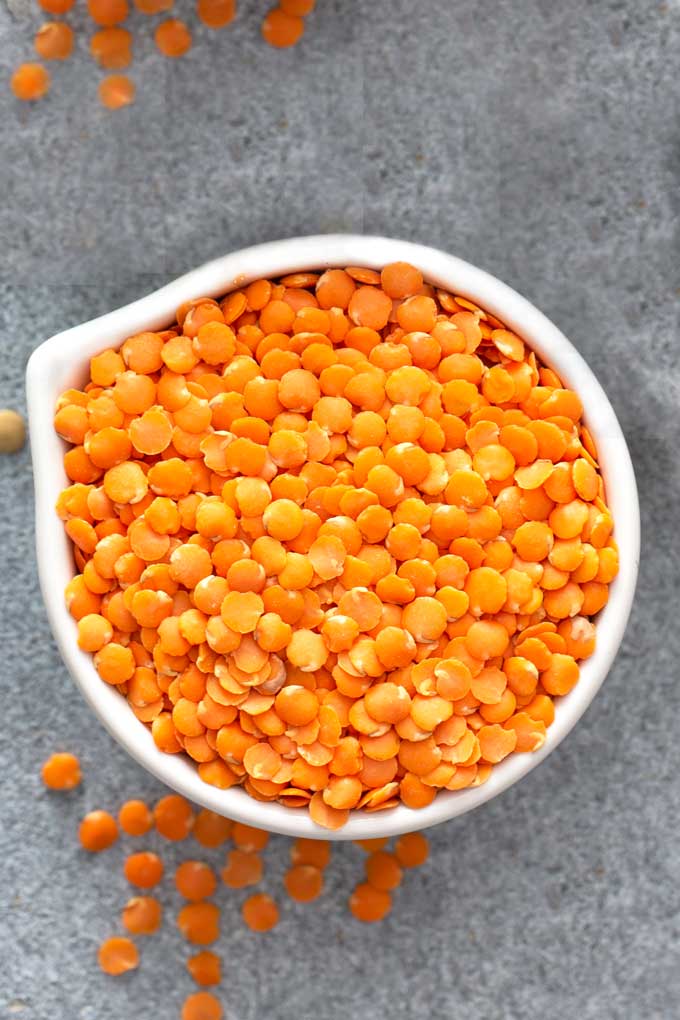 Red lentils in a white bowl