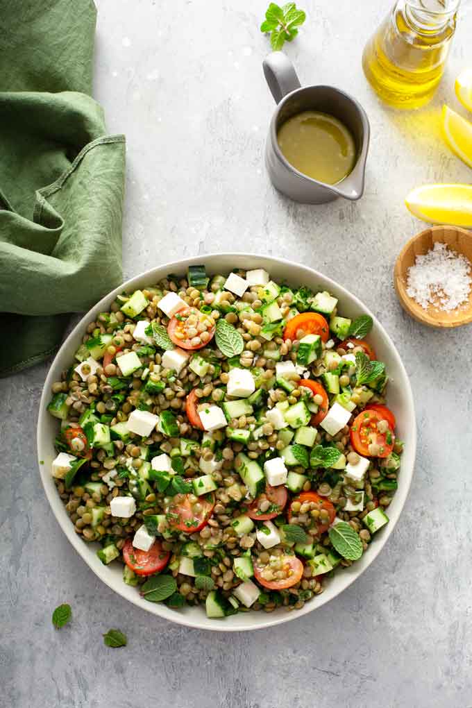 Top view of salad with lentils, herbs and vegetables