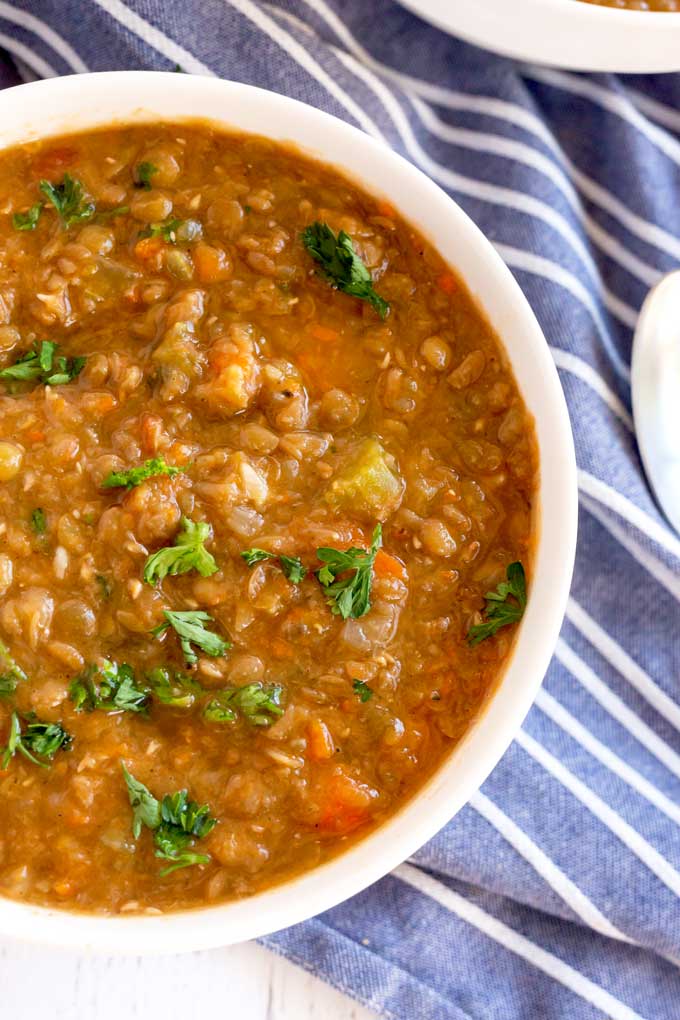 Close up top view of a bowl of lentil soup