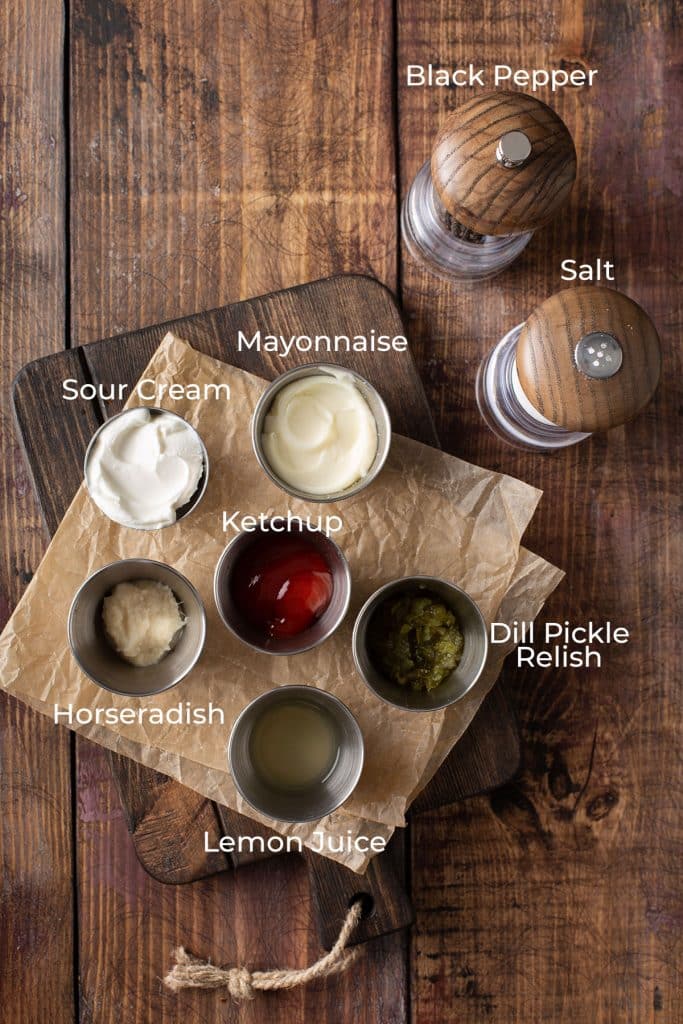 Ingredients to make Russian dressing on a wooden board