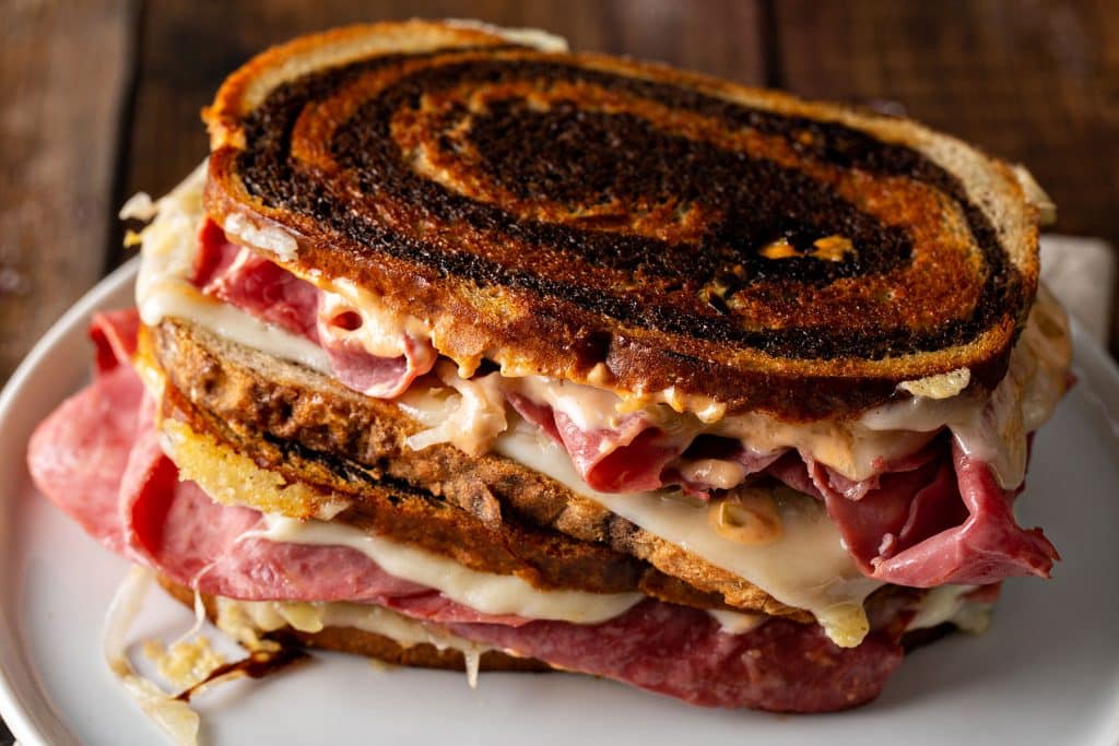 a close up view of a reuben sandwich 