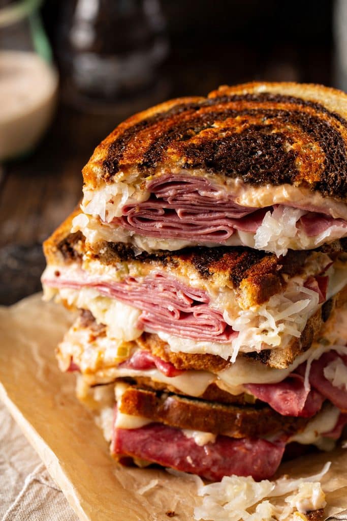 Cut up grilled corned beef sandwich 