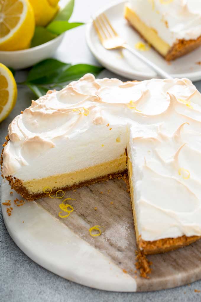 Creamy lemon pie cut up into slices