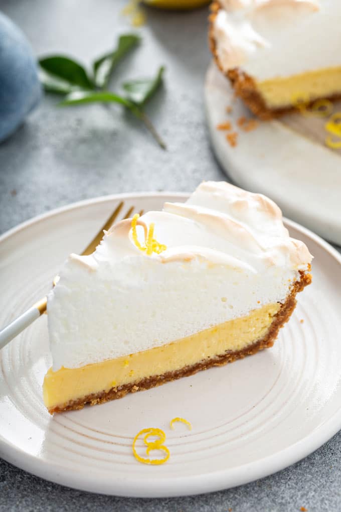 A slice of creamy lemon pie made with condensed milk on a plate