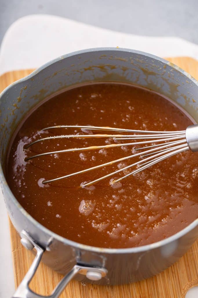 Caramel sauce in a saucepan.