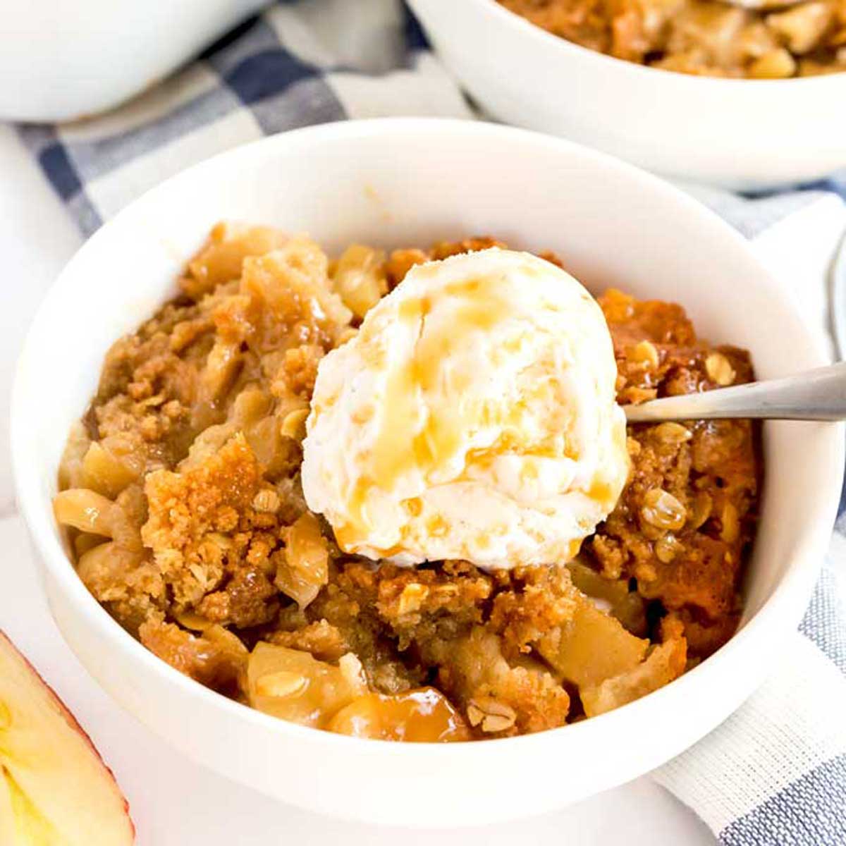 Homemade fruit crisp made with apples an a golden oat topping