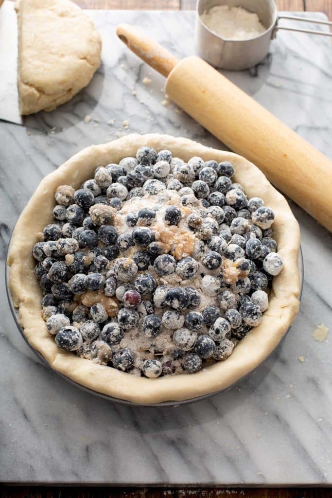 blueberry filling in the pie plate