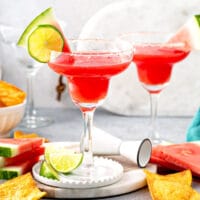 Watermelon margaritas made with fresh watermelon juice and tequila served in classic margarita glassware