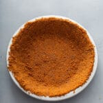 Baked biscoff cookie pie crust on a pie plate