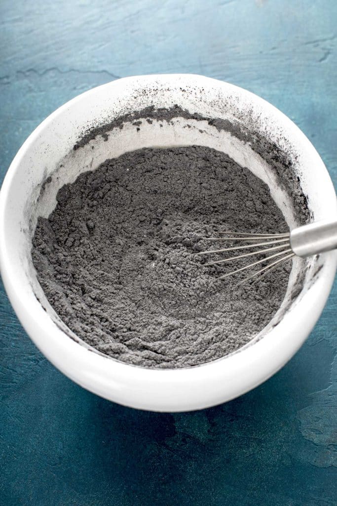 flour, sugar, cocoa powder, baking soda, baking powder and salt in a large white bowl