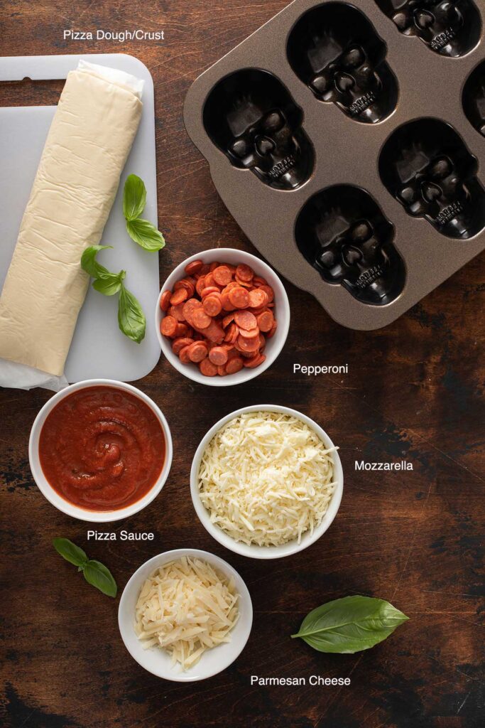 Ingredients to make halloween pizza