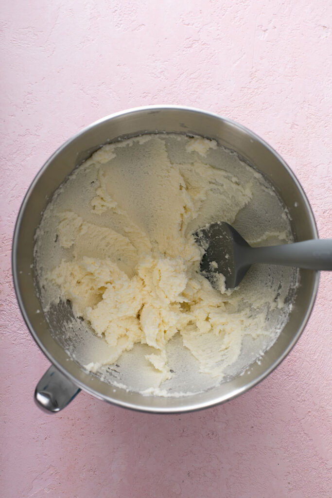 Using a stand mixer, the butter and sugar are beat together for 3 minutes. 