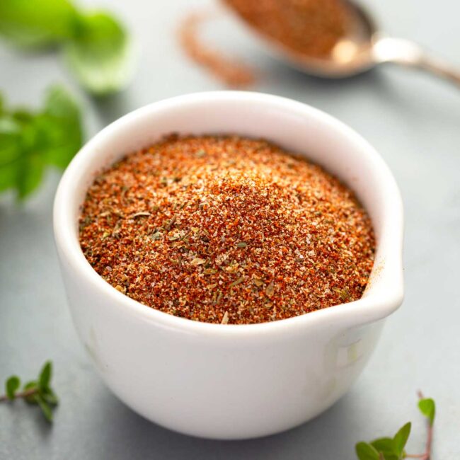 A small bowl with blackening seasoning spices