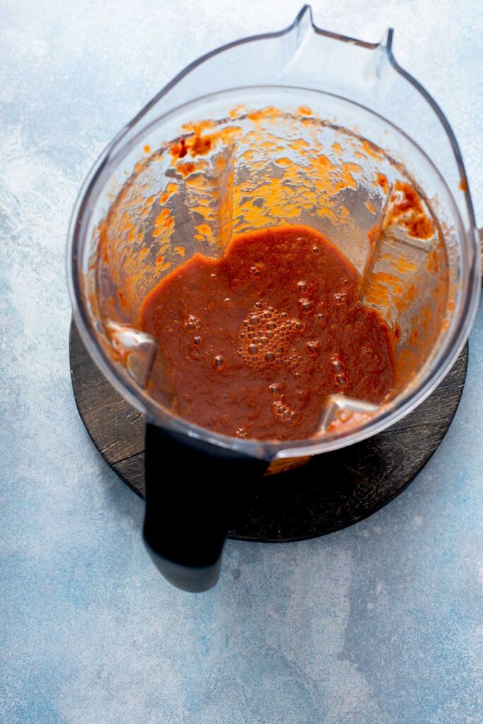 Smooth spicy chile tomato sauce in a blender