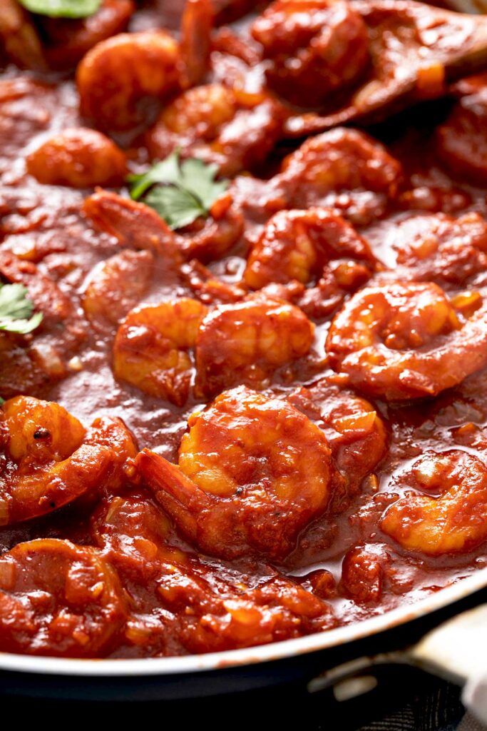 succulent large shrimp smothered in a thick spicy tomato sauce