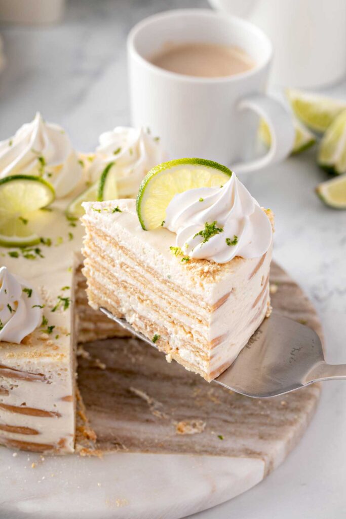 A slice of carlota de limon cake getting served