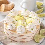 Mexican lime icebox cake or carlota de limon garnished with whipped cream and lime zest on a platter