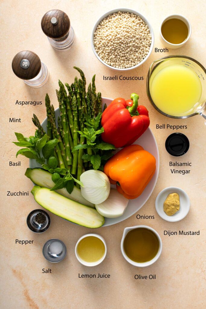 Ingredients to make pearl couscous salad and lemon vinaigrette