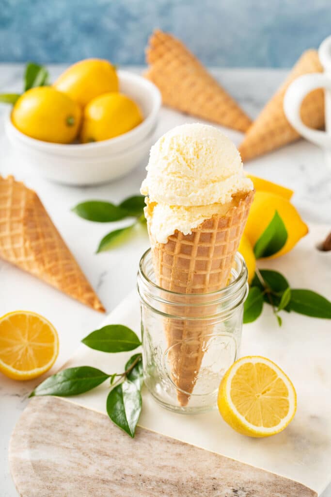 Ice cream cone with a scoop of creamy ice cream