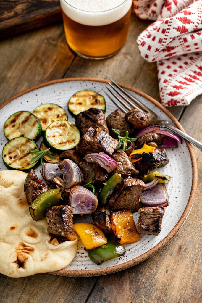 Grilled steak tips and veggies served with pita bread.