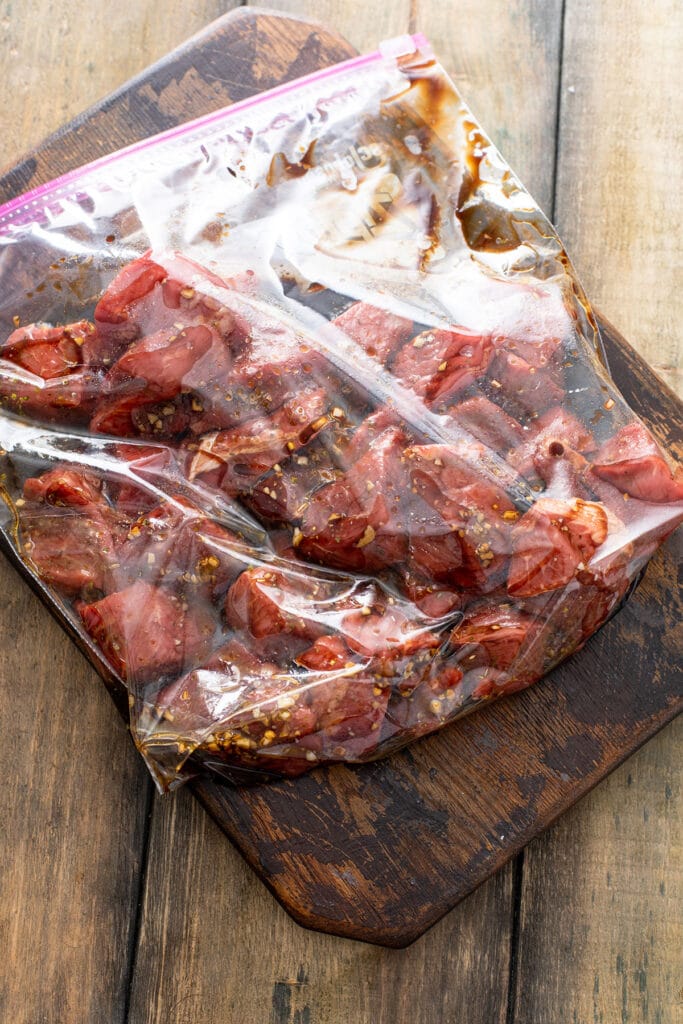 marinating steak tips in a ziplock bag 