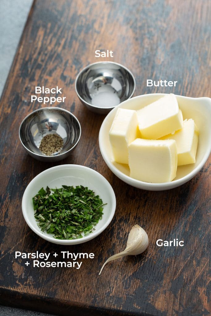 Ingredients to make garlic berb butter for steak.