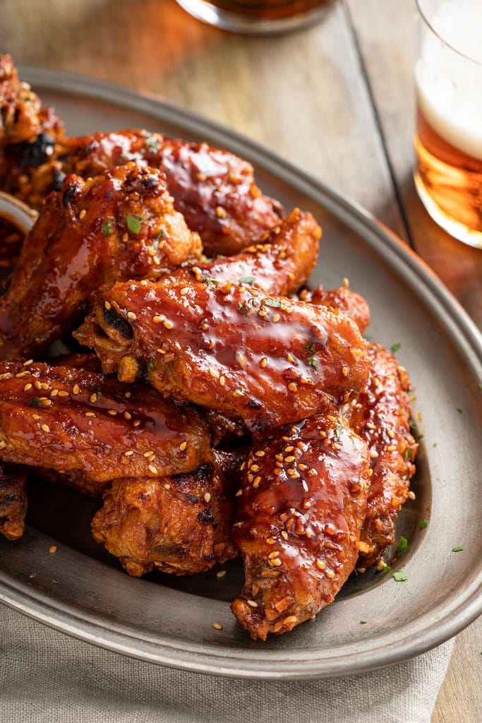 Crispy glazed chicken wings on a plate