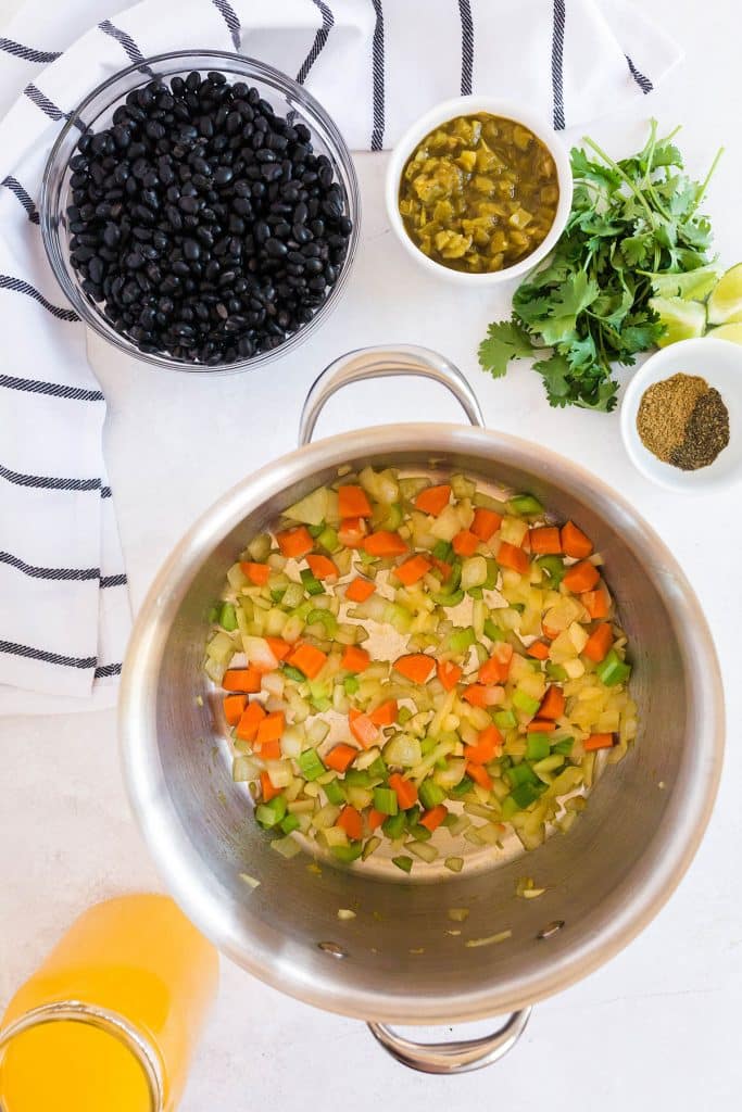 onion, carrot, celery and garlic cooking in a large pot