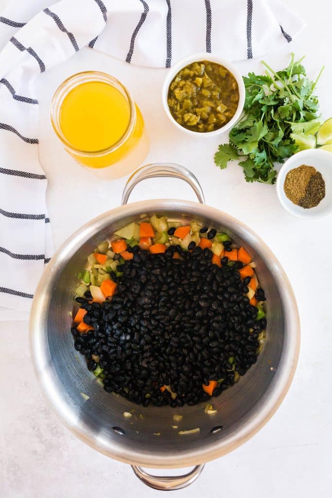 black beans cooking with veggies