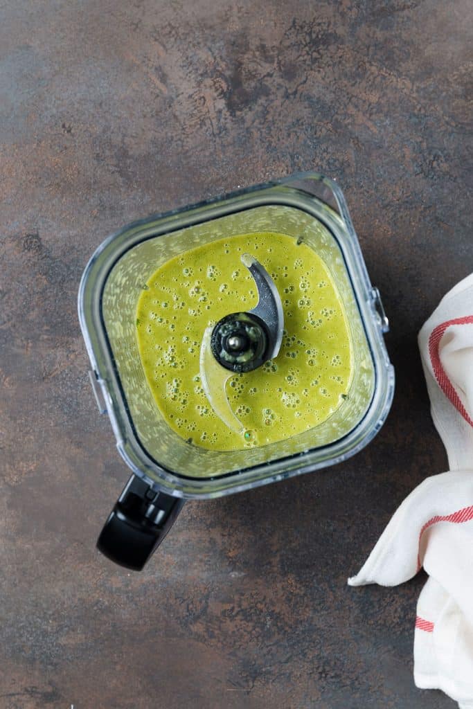 green smooth sauce in a blender